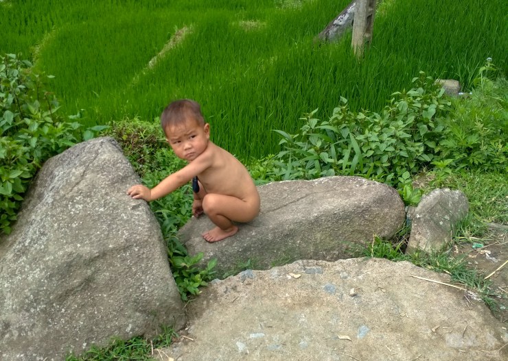 A weird feeling when you see a child of this age all alone playing on the rocks far away from his home